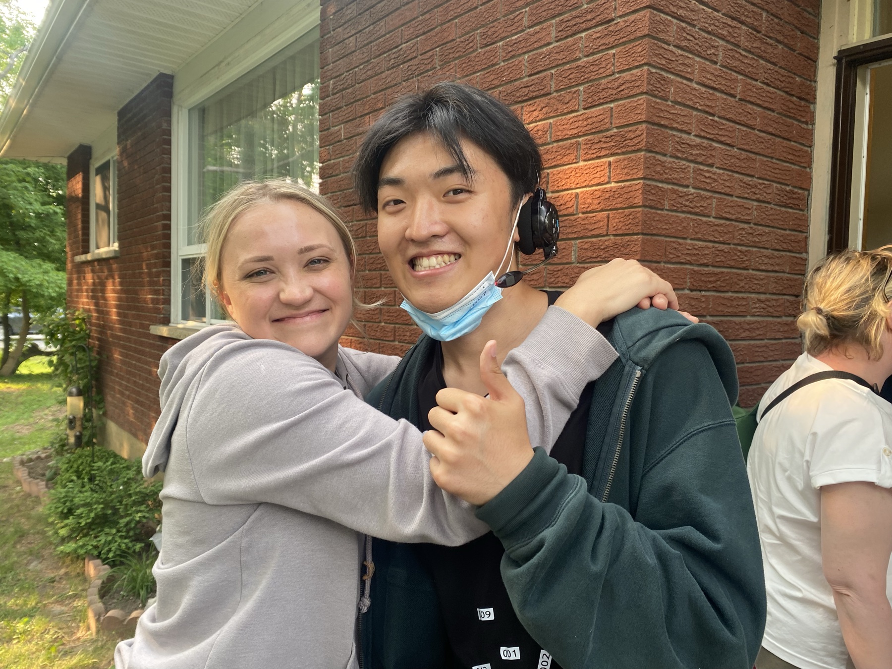 Boyi Tan with actor Emily Osment on set